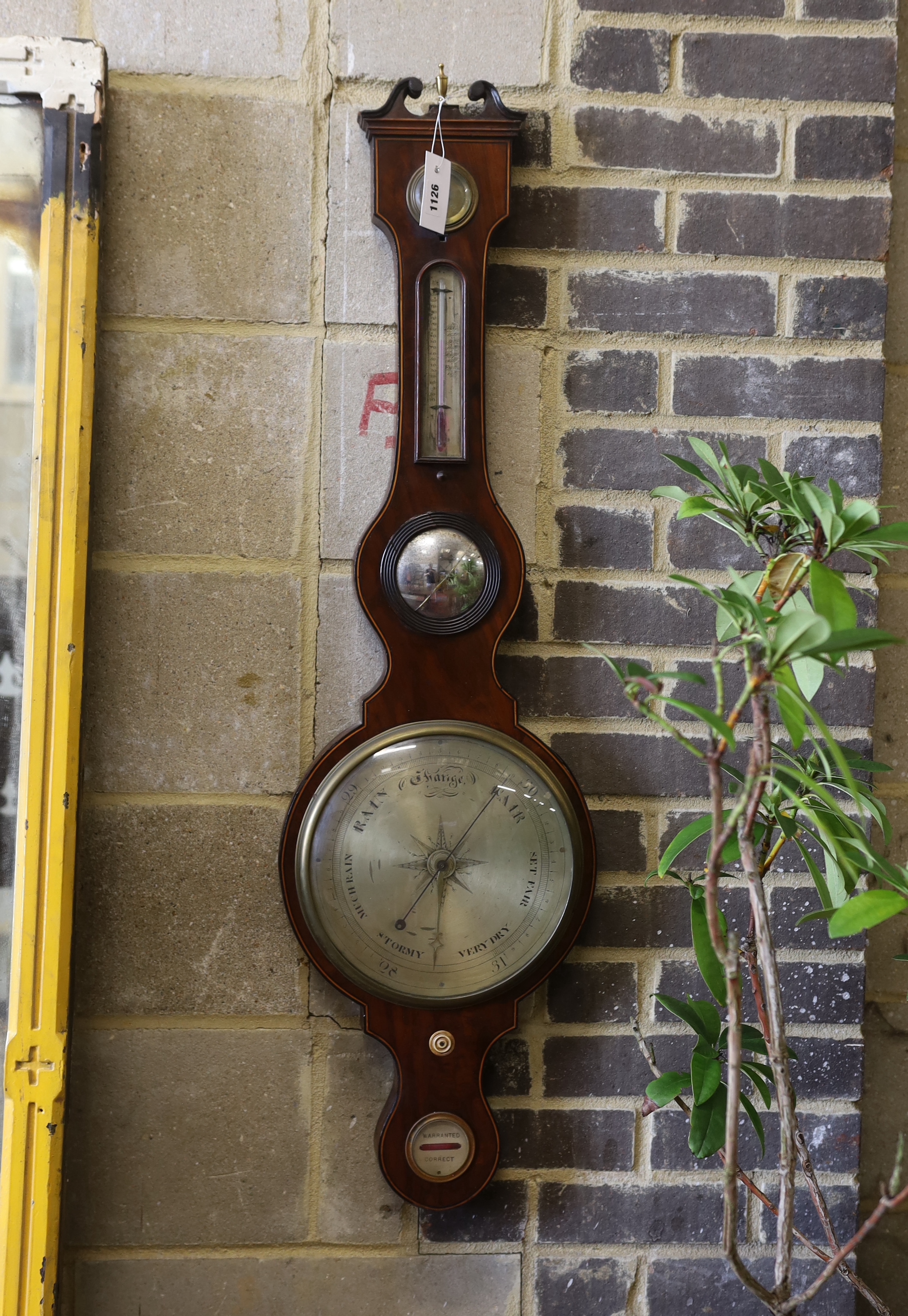 An early 19th century mahogany wheel barometer, height 110cm
